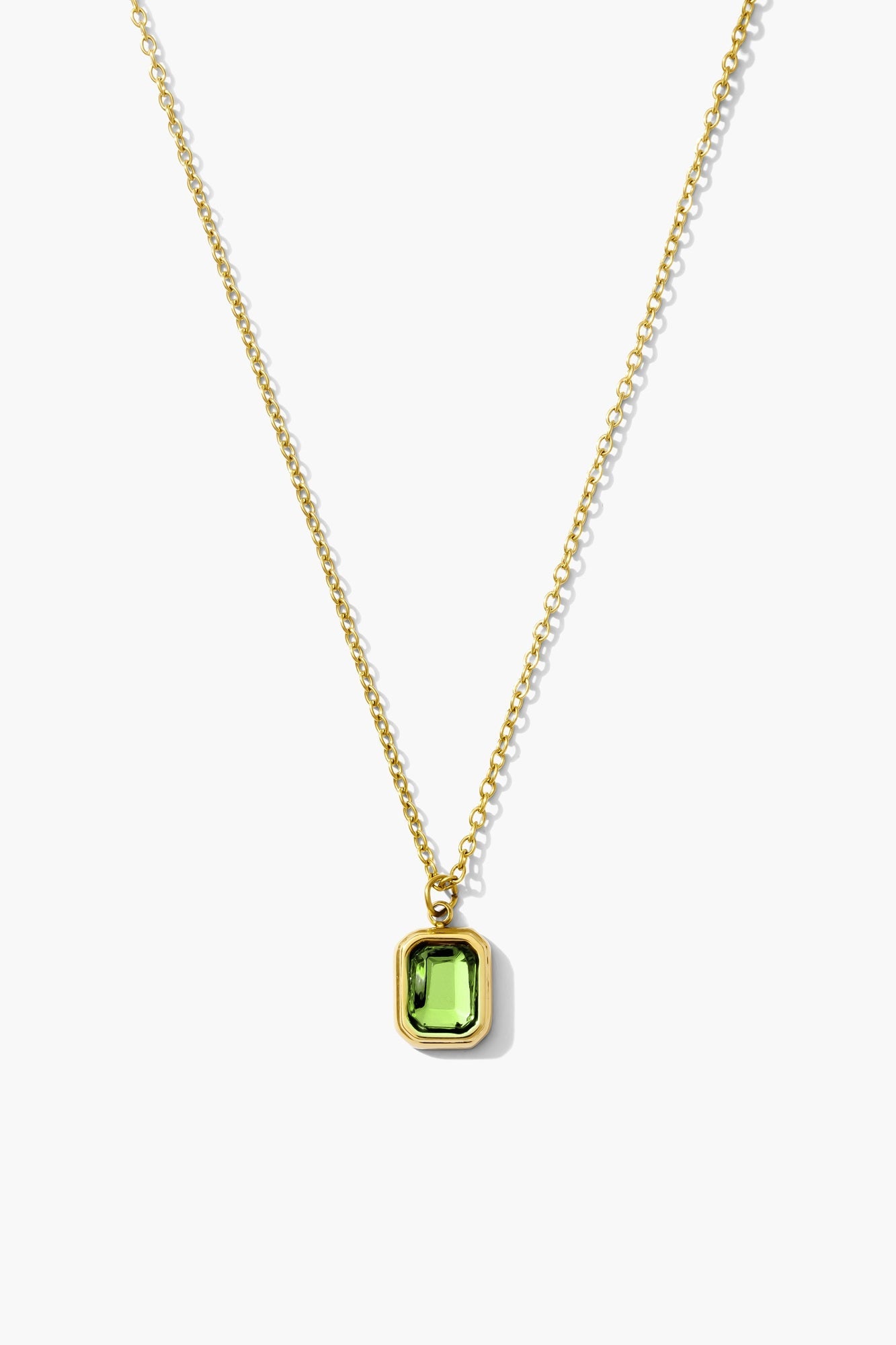 August peridot birthstone necklace, light green emerald-cut stone on an 18K gold plated chain